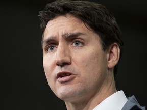 Prime Minister Justin Trudeau speaks with the media during a visit to a steel plant in Sault Ste. Marie, Ont., Friday, May 24, 2019. THE CANADIAN PRESS/Adrian Wyld ORG XMIT: ajw107