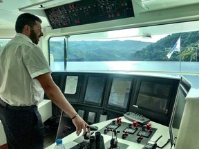Capt. Helder Conceicao guides CroisiEurope’s newest ship, the MS Amalia Rodrigues, through the Carrapatelo lock, the deepest in Europe. (PAT LEE)
