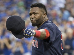David Ortiz salutes the fans after getting a gift before the game between the Toronto Blue Jays and  Boston Red Sox in Toronto, Ont. on Friday September 9, 2016. Craig Robertson/Toronto Sun