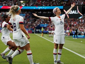 Megan Rapinoe of the U.S. celebrates scoring the first goal for the United States against France at the Parc des Princes, Paris, France on June 28, 2019.