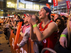 Logan Lindergaard watches Toronto Raptors during NBA Finals Game 4 against the Golden State Warriors held outside of the Scotiabank Arena at Jurassic Park in Toronto, Ont., on Friday, June 7, 2019. (Ernest Doroszuk/Toronto Sun/Postmedia Network)