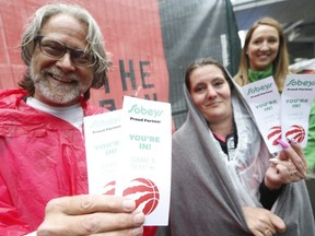 Toronto Raptors fans Doug Tiessen of Stoney Crekk and Angie Taylor of Cambridge receive a pair of tickets each for Game 5 on Monday June 10, 2019. Jack Boland/Toronto Sun