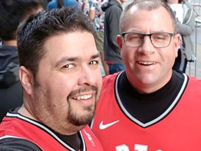Jazz Mathon and Allen McCauley take in the experience outside Scotiabank Arena in Toronto prior to Monday night's Toronto Raptors game. (Jazz Mathon Photo)