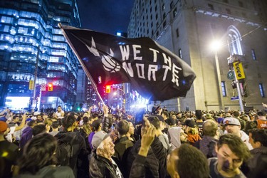 Fans fill the streets of downtown Toronto, Ont. celebrating the Toronto Raptors victory over the Golden State Warriors in the NBA Finals on Friday June 14, 2019. Ernest Doroszuk/Toronto Sun/Postmedia