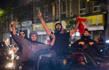 Fans fill the streets of downtown Toronto, Ont. celebrating the Toronto Raptors victory over the Golden State Warriors in the NBA Finals on Friday June 14, 2019. Ernest Doroszuk/Toronto Sun/Postmedia