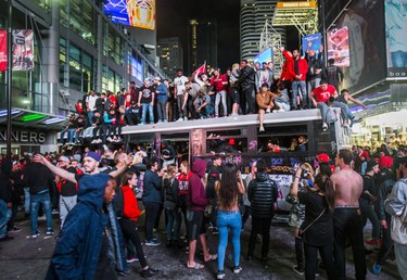 Fans fill the streets of downtown Toronto, Ont. celebrating the Toronto Raptors victory over the Golden State Warriors in the NBA Finals on Friday June 14, 2019. Ernest Doroszuk/Toronto Sun/Postmedia