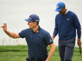 Justin Rose waves on the eighth green during the second round of the U.S. Open at Pebble Beach Golf Links on June 14, 2019 in Pebble Beach, California. (Ross Kinnaird/Getty Images)