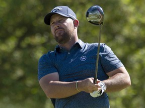 Scott Brown watches his drive on the 9th tee during the second round of the Canadian Open golf championship in Ancaster, Ont., Friday, June 7, 2019. (THE CANADIAN PRESS/Adrian Wyld)