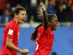Nichelle Prince celebrates scoring Canada's second goal with Christine Sinclair against New Zealand at the 2019 Women's World Cup in Grenoble, France on Saturday, June 15, 2019.