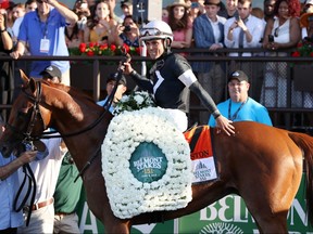 Jockey Joel Rosario is up on Sir Winston who won the 151st running of the Belmont Stakes at Belmont Park on June 8, 2019 in Elmont, New York. (NICOLE BELLO/Getty Images)