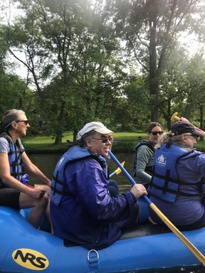 Paddlers guide a raft along the Huron River in Ann Arbor, Mich. (ERIC ECKARD photo)