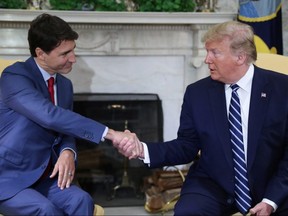 U.S. President Donald Trump meets with Canada's Prime Minister Justin Trudeau in the Oval Office of the White House in Washington, D.C., on Thursday, June 20, 2019.