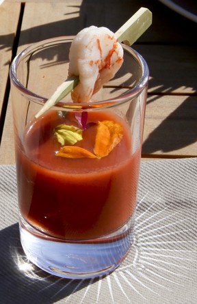 Strawberry and watermelon soup with shrimp skewer garnish