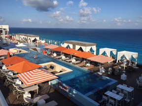 The view of the Caribbean Sea on the Sky Club rooftop lounge at the Royalton Suites Cancun. (Michael Traikos)