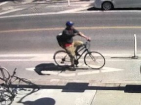 A photo released by Toronto Police of a cyclist believed to have thrown a bottle containing a corrosive substance at a couple and their baby near Bloor and Christie Sts. on Thursday, Just 6, 2019.