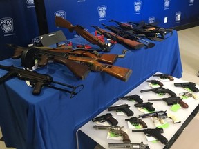 Peel Regional Police display the firearms, weapons and ammunition returned as part of the 2019 Spring Gun Amnesty during a press conference at Peel Regional Police Headquarters in Mississauga, Ont. on Tuesday June 4, 2019.