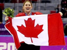 Hayley Wickenheiser celebrates gold for Team Canada at the Sochi Games in 2014. AL CHAREST/POSTMEDIA