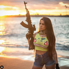 Orin Julie, 25, is a menacing presence on social media where she regularly posts photos of her herself in seductive poses — and shooting guns. INSTAGRAM