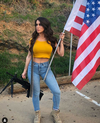 Orin Julie, 25, is a menacing presence on social media where she regularly posts photos of her herself in seductive poses — and shooting guns. INSTAGRAM