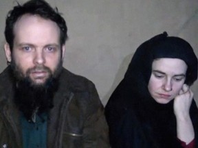 An undated militant image from video shows Canadian Joshua Boyle and American Caitlan Coleman during their captivity.