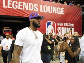 LeBron James of the Los Angeles Lakers arrives at a Summer League game on Friday night in Las Vegas. (GETTY IMAGES)
