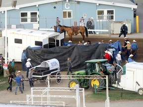 Crash during heat 7 of the Rangeland Derby at the Calgary Stampede in Calgary on Thursday, July 11, 2019. Darren Makowichuk/Postmedia