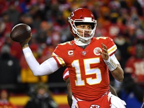 Patrick Mahomes #15 of the Kansas City Chiefs looks to pass in the second half against the New England Patriots during the AFC Championship Game at Arrowhead Stadium on January 20, 2019 in Kansas City, Missouri.