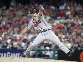 National League pitcher Mike Soroka of the Atlanta Braves throws during the sixth inning of the MLB All-Star Game on Tuesday night. The Calgary native had a successful all-star debut, pitching a 1-2-3 sixth inning. (John Minchillo/The Associated Press)