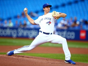 Jacob Waguespack of the Toronto Blue Jays delivers a pitch in the first inning during a MLB game against the Tampa Bay Rays at Rogers Centre on July 26, 2019 in Toronto, Canada.