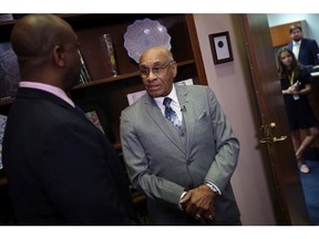 National Hockey League Hall of Famer Willie ORee (R) speaks with Sen. Tim Scott (R-SC) on Capitol Hill July 25, 2019 in Washington, DC. ORee, the first black player to compete in the National Hockey League, visited Capitol Hill following an announcement that he would receive the Congressional Gold Medal.