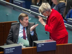 Toronto Mayor John Tory chats with Councillor  Paula Fletcher during a council meeting on Jan. 30, 2019. (Ernest Doroszuk,Toronto Sun)