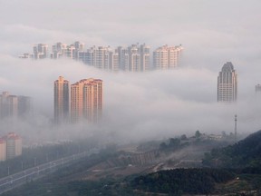 A view of the city of Yantai is seen in a blanket of fog on May 14, 2012 in Shandong Province of China.