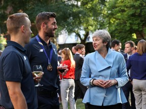Britain's Prime Minister Theresa May attends a reception for the England cricket team on Monday. (REUTERS)