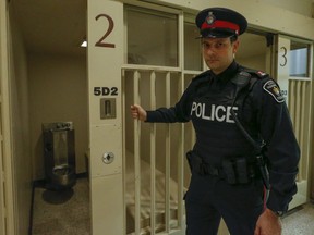 York Regional Police Const.  Andy Pattenden shuts a cell door. (Toronto Sun files)