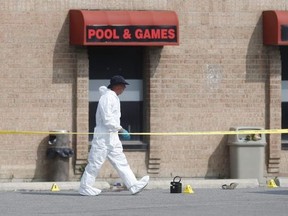 Peel Regional Police forensic officers at the scene of a fatal shooting Monday, July 8, 2019 outside Fume Bar and Lounge in Mississauga. Ernest Doroszuk/Toronto Sun