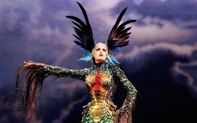 In this file photo, British model Yasmin Le Bon wears a design made with feathers, horsehair and Swarovski crystals from Thierry Mugler’s fall/winter 1997-1998 collection. (Alan Strutt/Montreal Musieum of Fine Arts photo)