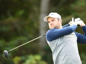 Canada's Corey Conners tees off from the 5th hole during the first round of the British Open golf Championships at Royal Portrush golf club in Northern Ireland on July 18, 2019.