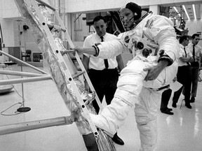 U.S. astronaut Neil Armstrong, does a rehearsal for his moon walk at Cape Kennedy Space Center on July 15, 1969.