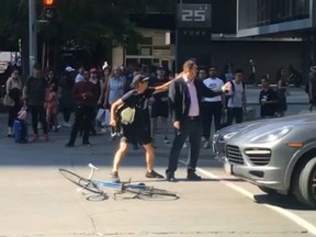 Toronto Police are investigating after a video captured an alleged assault by an angered cyclist. (Reddit)