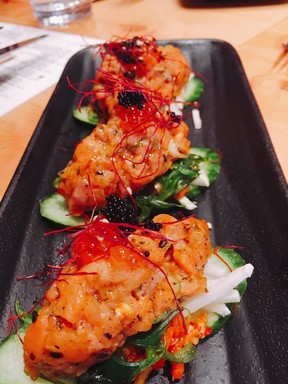 Block Kitchen is a locals’ favourite, serving dishes like spicy salmon tartare with shaved chili pepper and flying fish roe. (Kevin Hann)