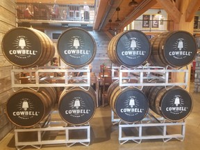 Cowbell’s brewery and restaurant is a warm and inviting post-and-beam structure. Wooden barrels are displayed near the main entrance. IAN SHANTZ/TORONTO SUN