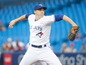 Toronto Blue Jays starting pitcher Aaron Sanchez  throws a pitch during the first inning against the Cleveland Indians at Rogers Centre July 23, 2019.