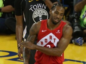 Toronto Raptors forward Kawhi Leonard (2) reacts during the second half in game six of the 2019 NBA Finals against the Golden State Warriors at Oracle Arena.