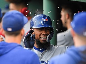 Toronto Blue Jays left fielder Teoscar Hernandez celebrates with his teammates after hitting a home run against the Boston Red Sox Tuesday at Fenway Park. (Brian Fluharty-USA TODAY Sports)