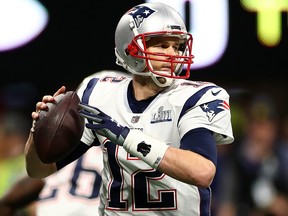 New England Patriots quarterback Tom Brady makes a pass against the Los Angeles Rams during Super Bowl LIII at Mercedes-Benz Stadium on Feb. 3, 2019 in Atlanta, Ga.
