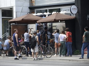 More than a week after Toronto Police sealed off an illegal Cafe cannabis dispensary on Harbord St., the street out front was bustling with activity on Saturday July 27, 2019.