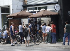 More than a week after Toronto Police sealed off an illegal Cafe cannabis dispensary on Harbord St., the street out front was bustling with activity on Saturday July 27, 2019.