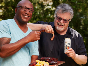 Chefs Robert Rainford (L) and Ted Reader on the cover of the Real Guys of Canada calendar.