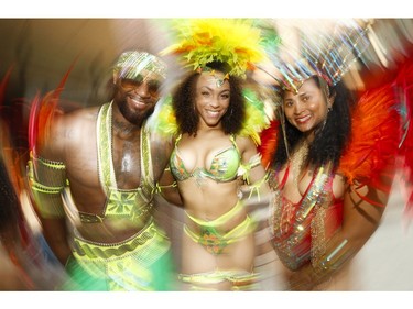 Toronto Revellers masqueraders Paul Anthony Perez, Mahogany Brown and Melissa Sobers at Toronto Police held there Caribbean Carnival kick-off 2019 in preparation for the parade on August 3rd weekend on Friday July 26, 2019. Jack Boland/Toronto Sun/Postmedia Network