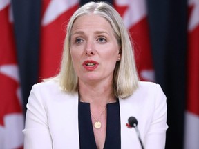 Former environment minister Catherine McKenna, currently Canada's Minister of Infrastructure and Communities, speaks at a news conference in Ottawa on June 18, 2019.